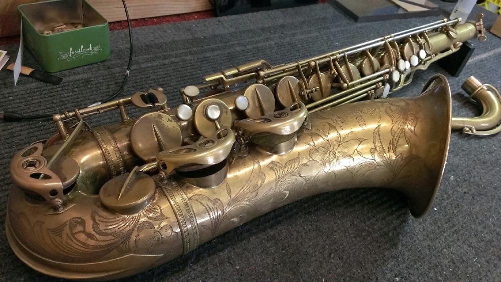 Some nice re-engraving by Jerome Brownstein, an old-time NYC hand engraver who also did work for Bach Mt. Vernon, on this Selmer SBA.