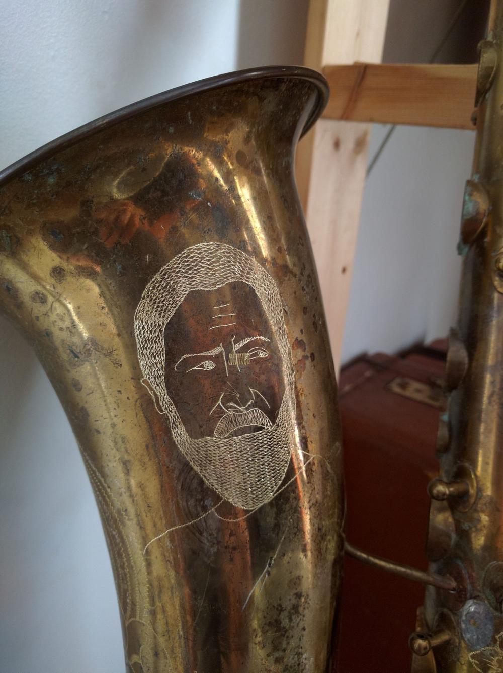 Me engraved on a sax bell (I did not do this).