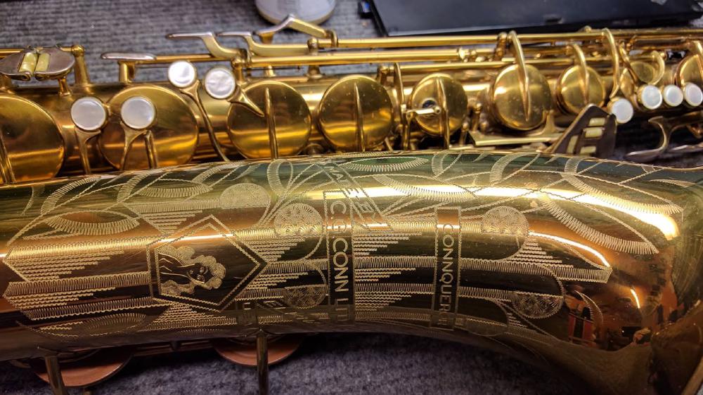 Lovely engraving on this pristine Conn 30M tenor saxophone.