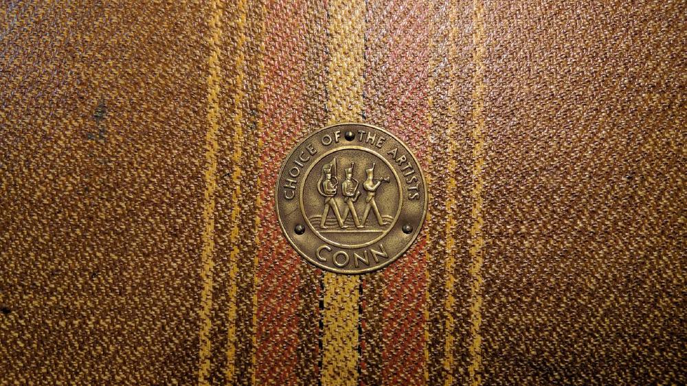 Case for a Conn 30M. Apparently this was called 'airplane cloth' and is seen on cases from the time for other instruments as well.