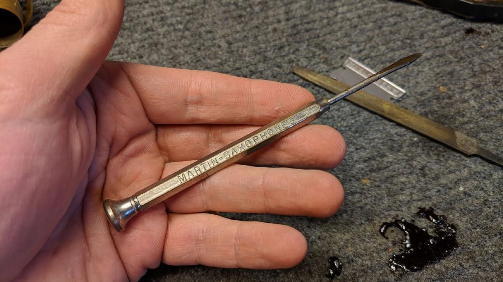 Martin screwdriver. I love the old branded sax tools.