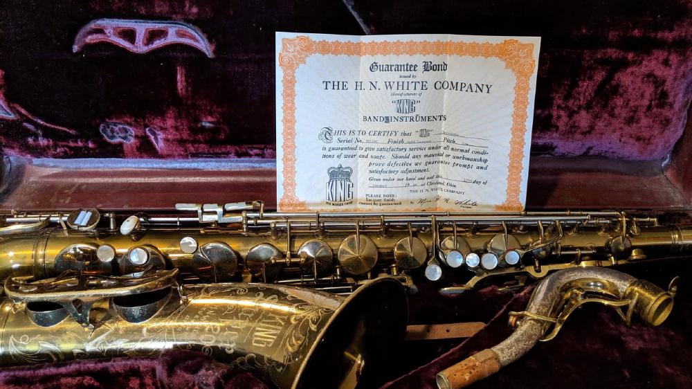 King Super 20 tenor with the original 'Guarantee Bond'.