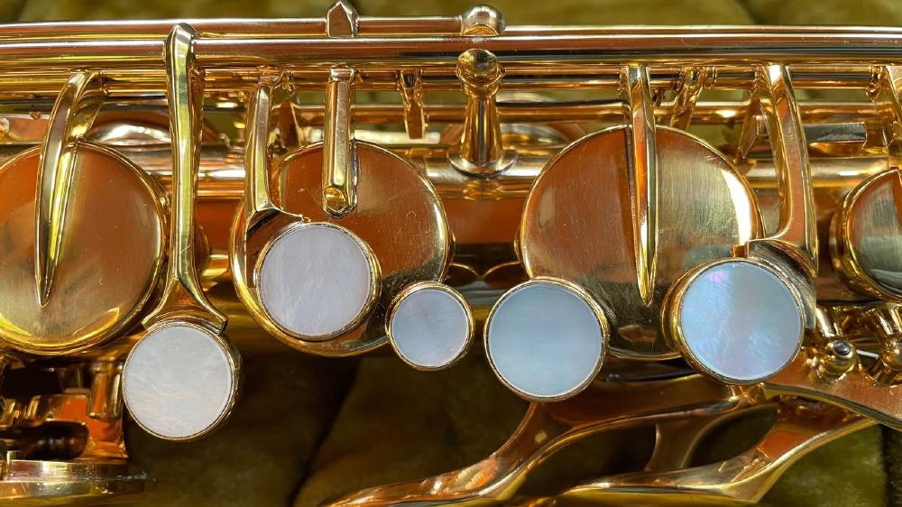 Martin Magna tenor saxophone in gold plate, upper stack detail.