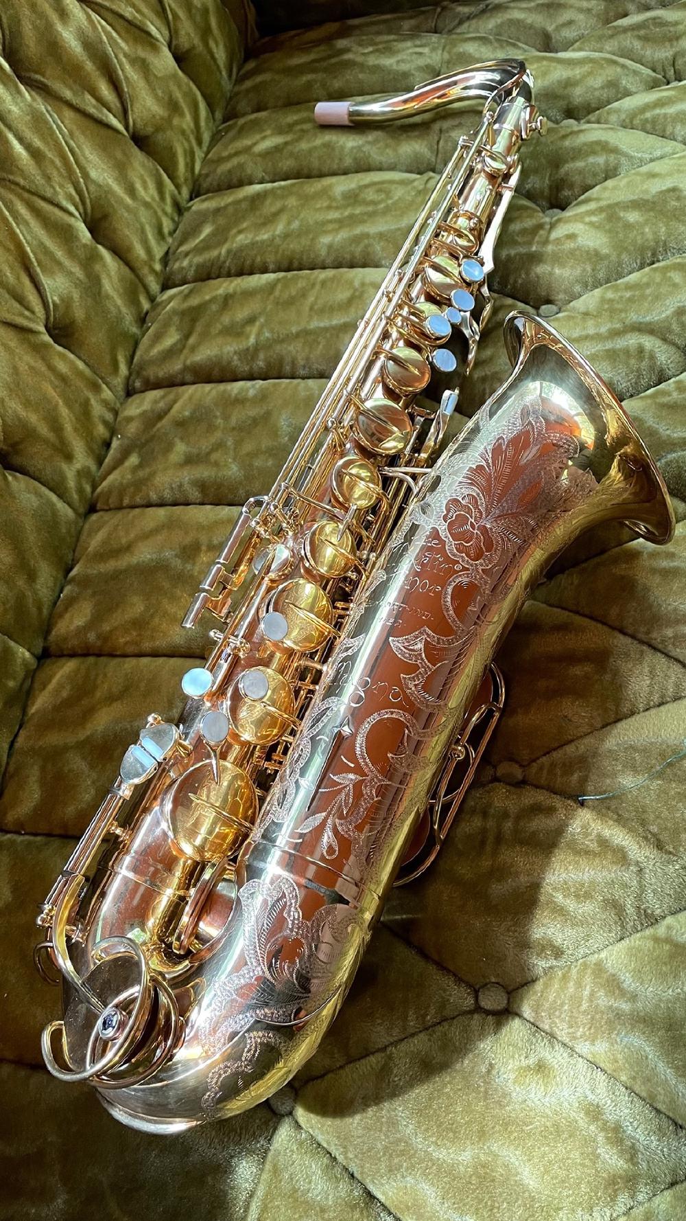 Gold-plated Martin Magna tenor saxophone with solid silver neck.