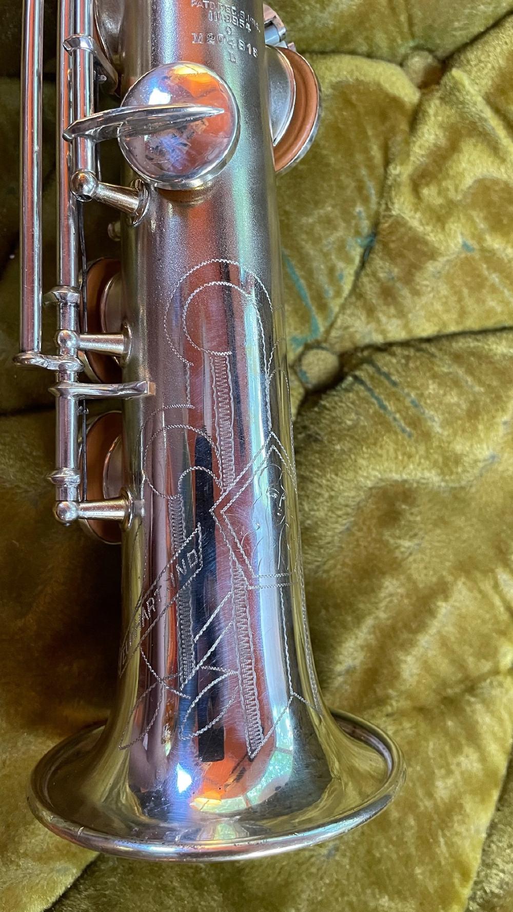 Conn C-soprano with the 'naked lady' engraving. Only one I have seen.