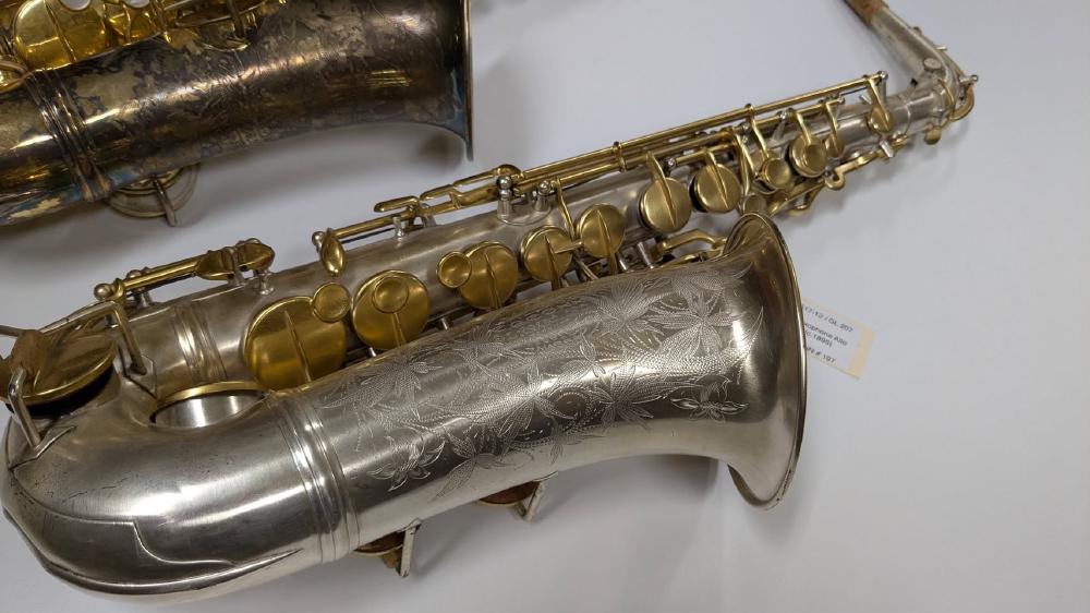One of the first saxophones built by C.G. Conn. High pitch alto, silver and gold plate with ornate engraving, 1890s.