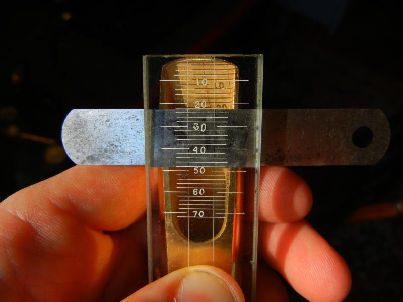 Using the glass plate and the .0015" feeler gauge to measure the “break”.