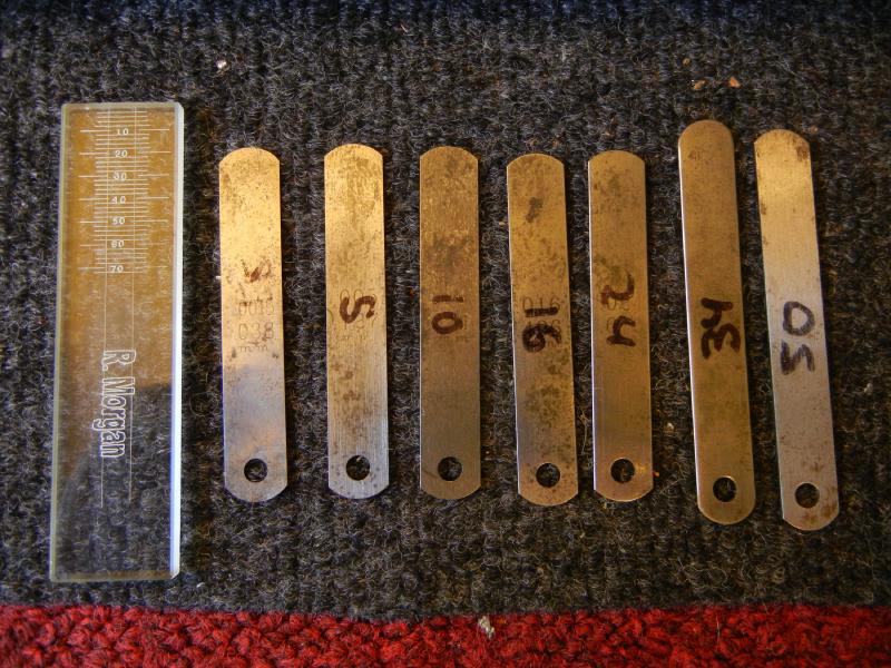 Mouthpiece facing glass gauge and some feeler gauges.