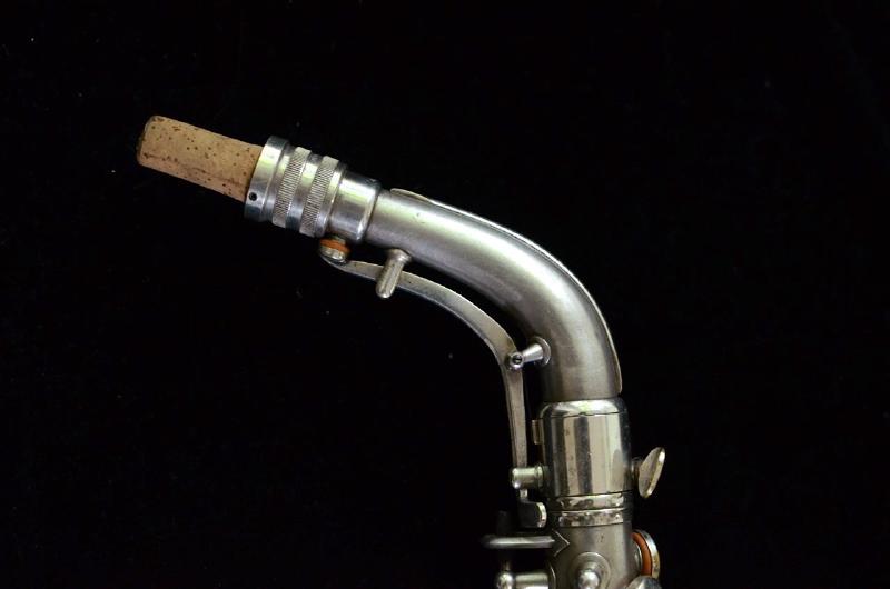 Conn 206,xxxX (?) alto saxophone neck detail. The neck is marked STD’D M.