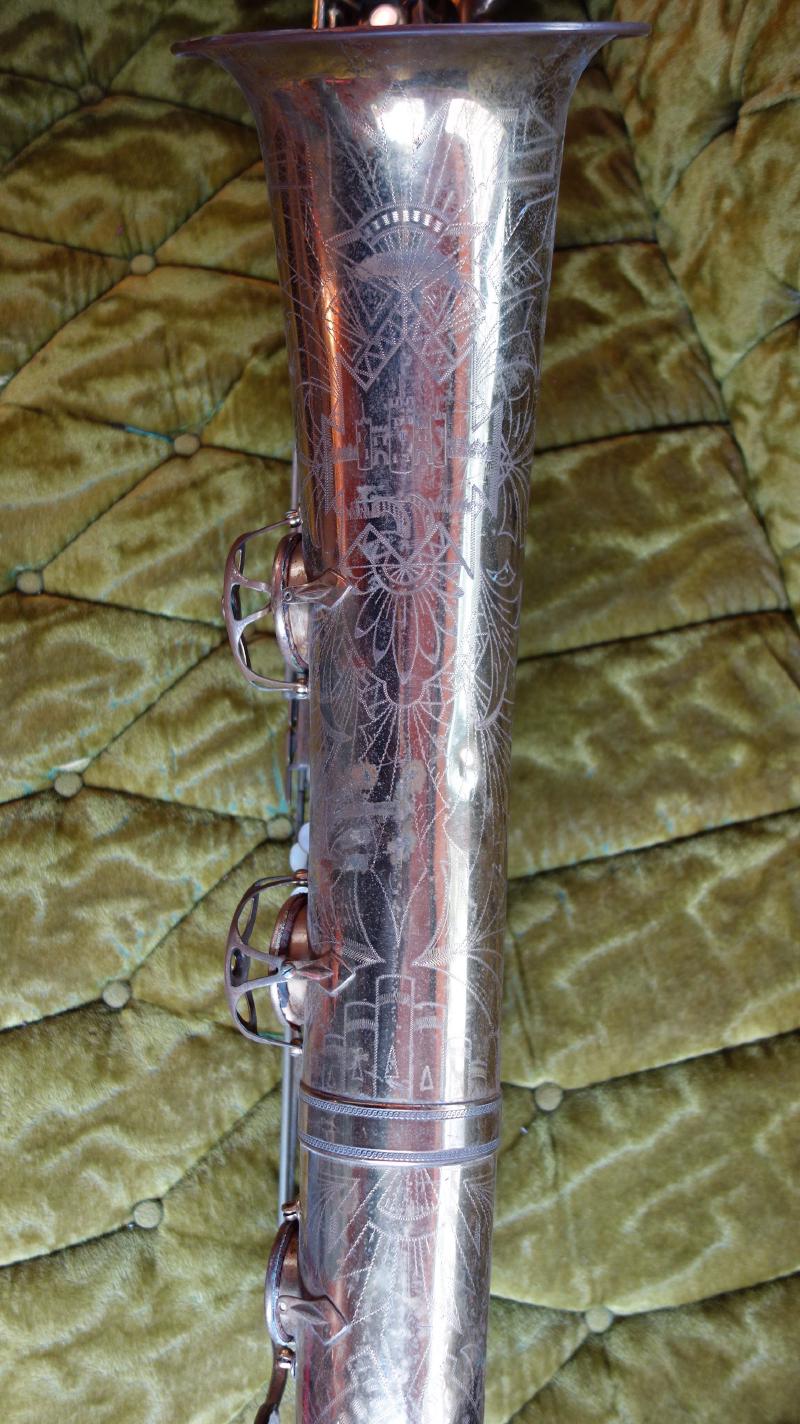That engraving is awesome! Also, someone bent a leg of the low Bb key cage to wedge the low Bb shut, which is a first for me.