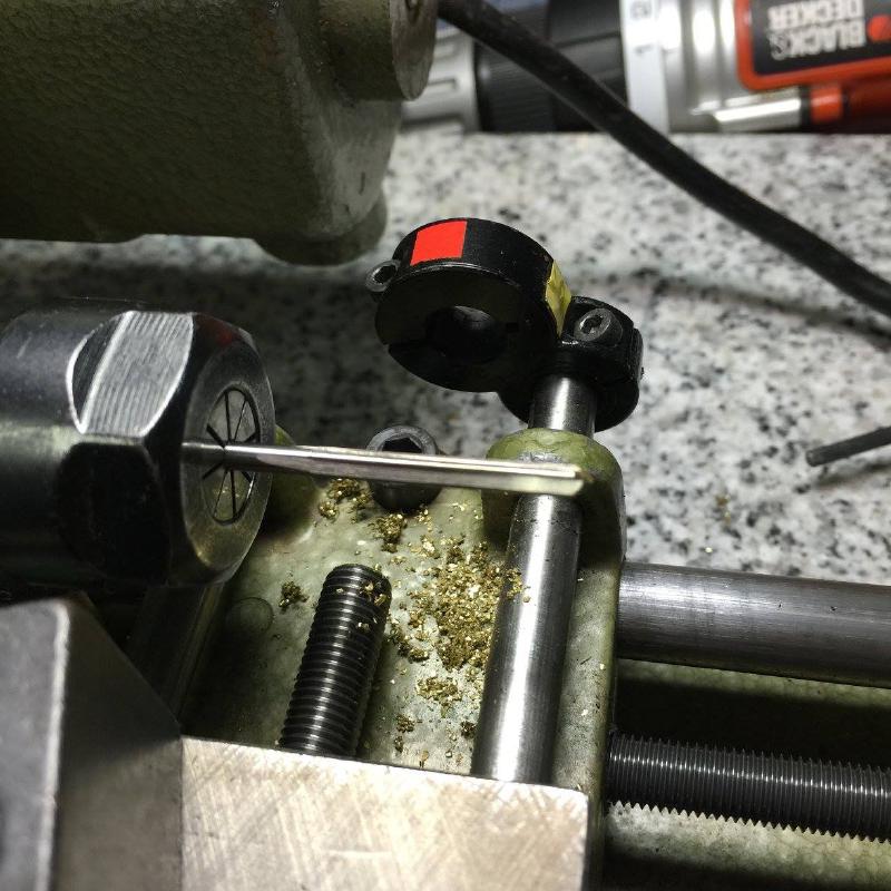 To start, I mounted an appropriate size straighte chucking reamer in the lathe head stock collet.