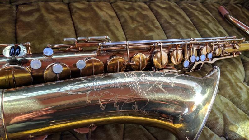 Nearly immaculate Selmer Radio Improved tenor. This one came to me wearing original pads, which is the first time I have seen that on a Radio Improved.