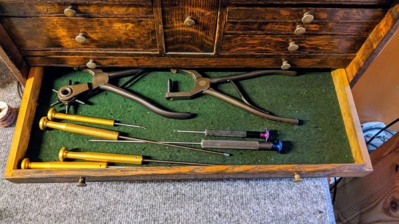 Hole punches and screwdrivers.