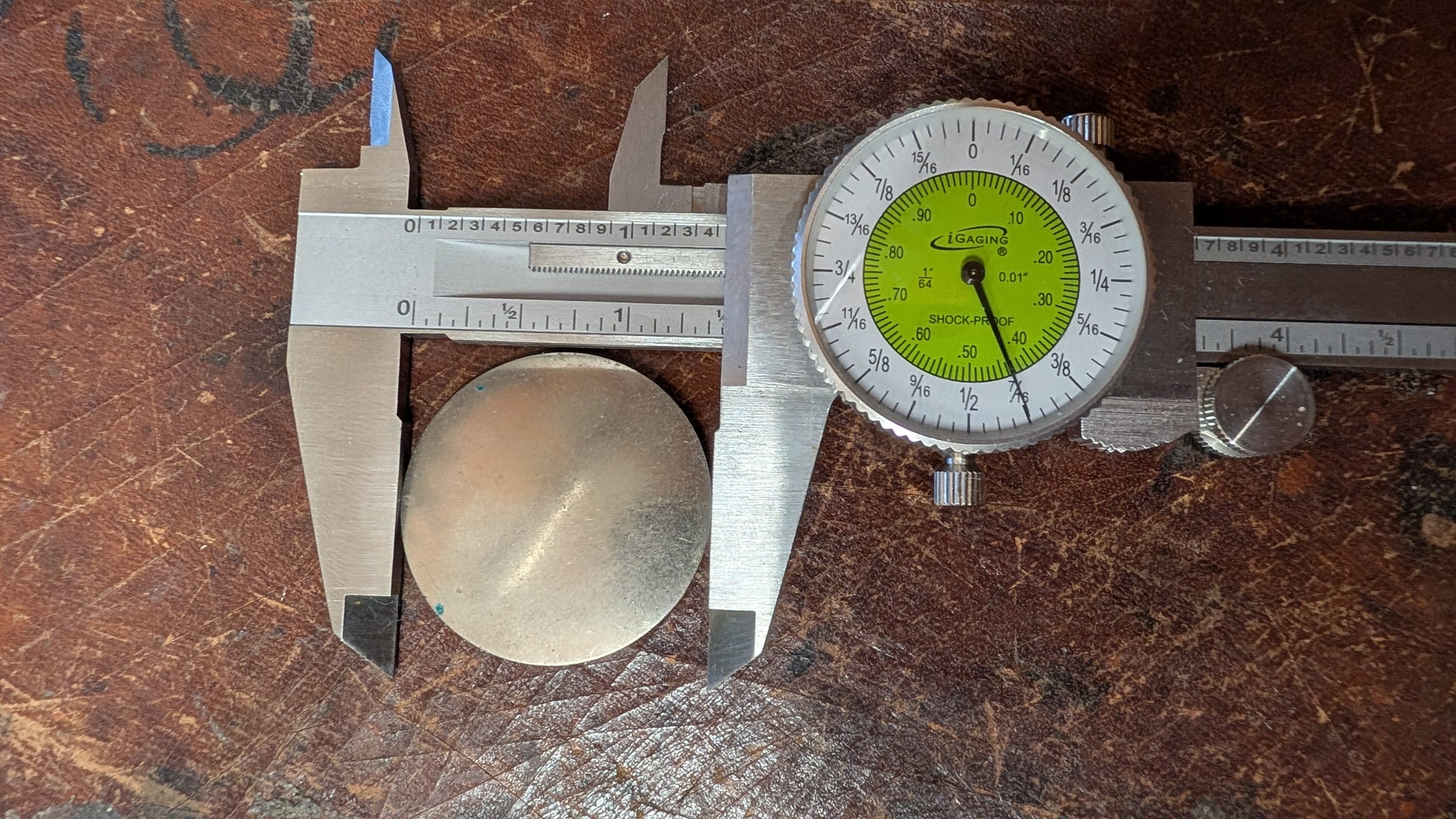 An original Selmer tone booster on a fractional dial caliper. The dial reads in sixteenths, which is how these were laid out in the first place- put a metric caliper on one and you get an awkward decimal instead of a clean fraction. An original Selmer tone booster on a fractional dial caliper. The dial reads in sixteenths, which is how these were laid out in the first place- put a metric caliper on one and you get an awkward decimal instead of a clean fraction.